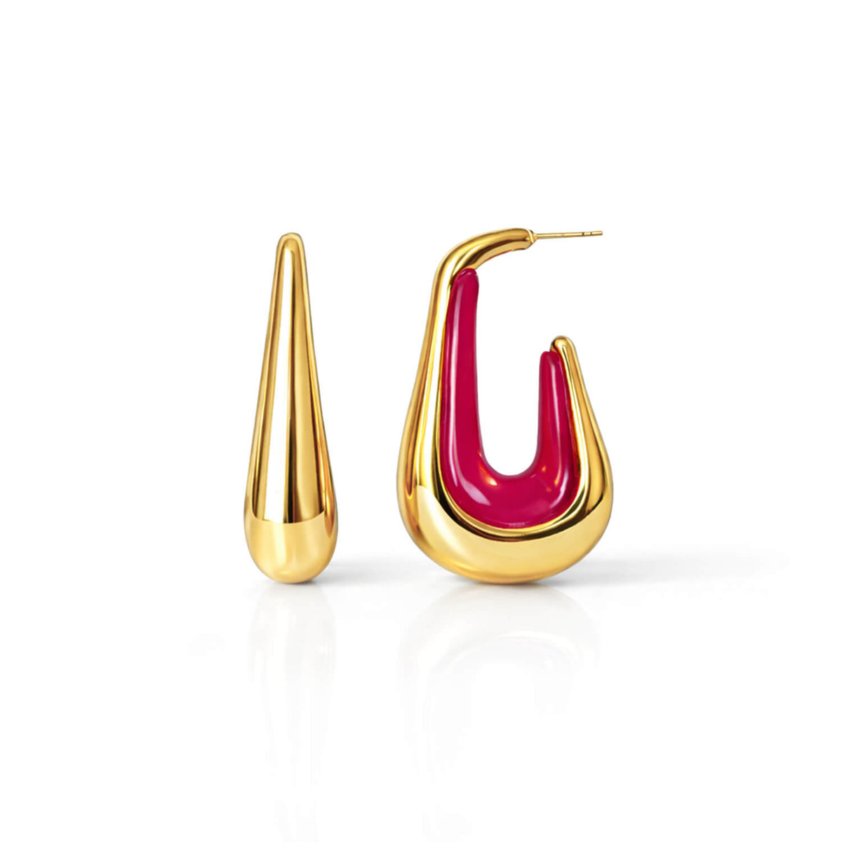 Gold and pink earrings on a white background