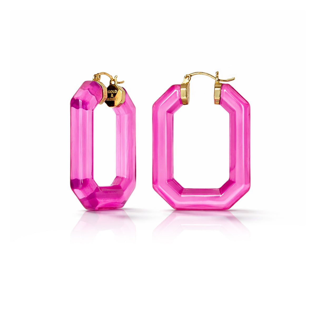 Pink hoop earrings with gold accents on a white background