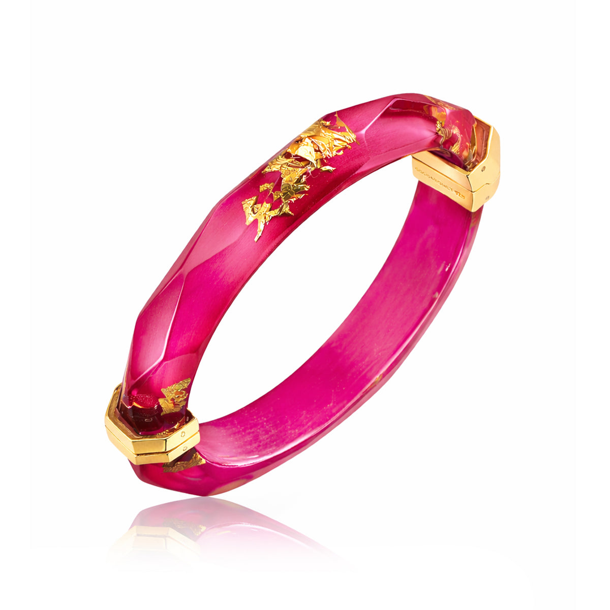 Pink bracelet with gold accents on a white background