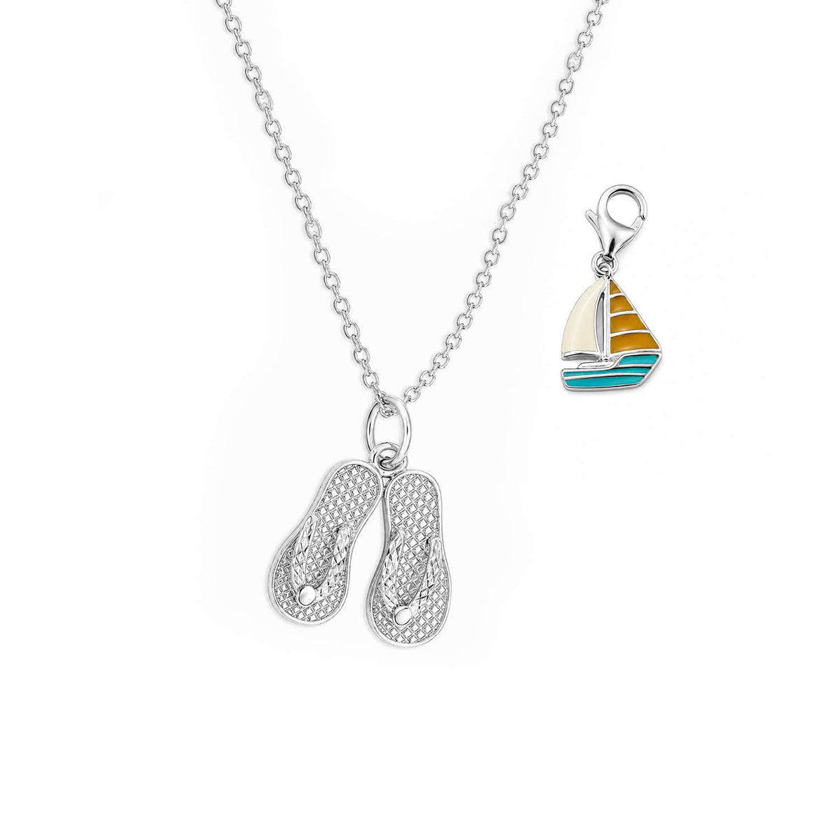 Necklace with a sailboat pendant on a white background