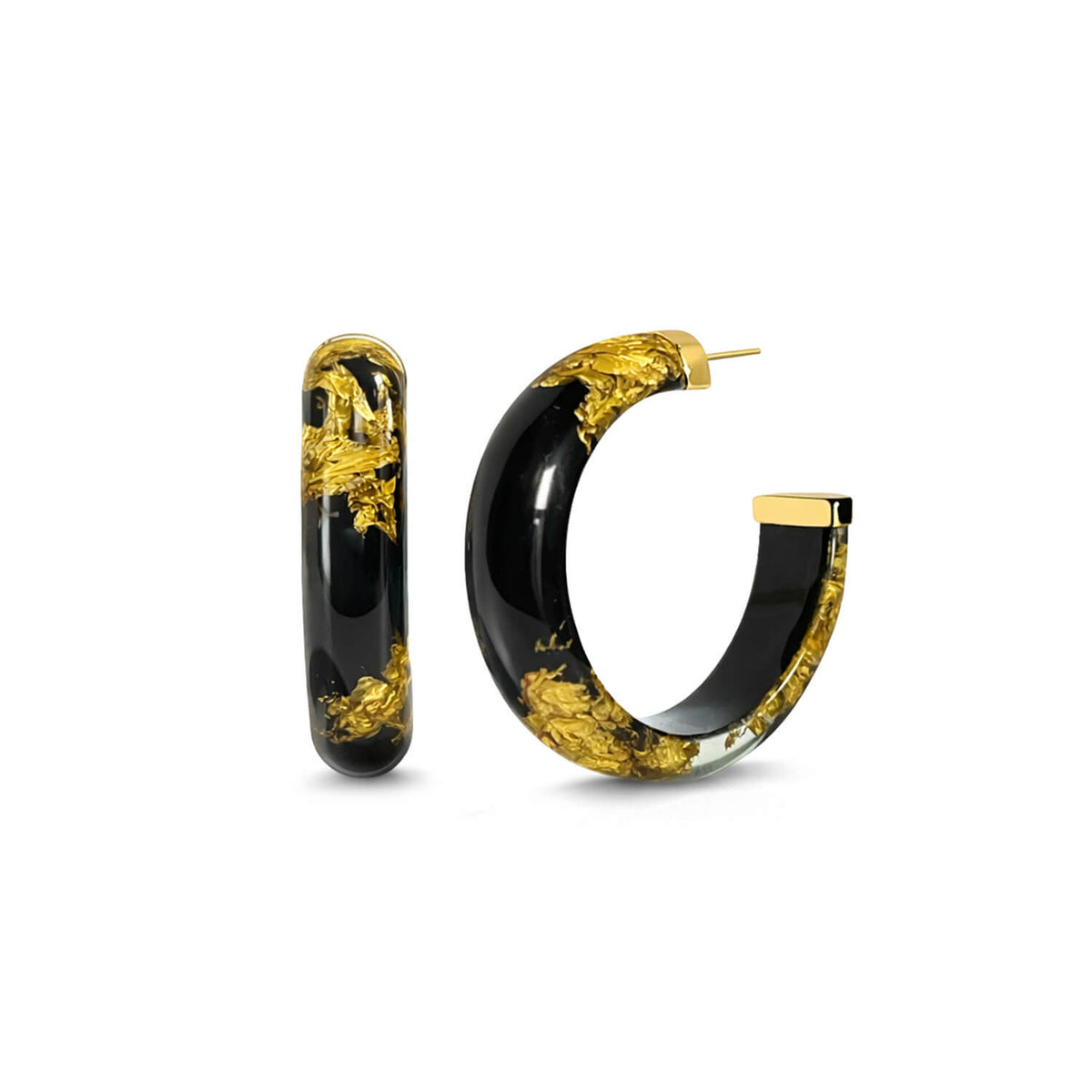 Black and gold hoop earrings on a white background