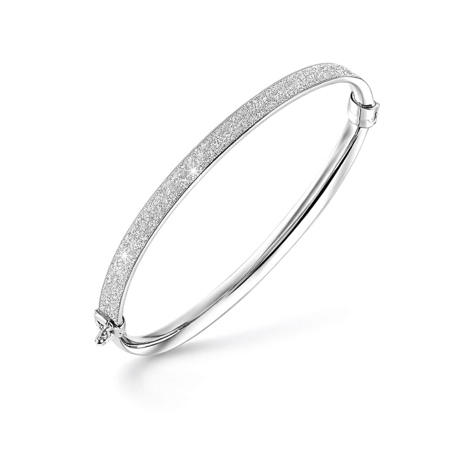 Silver bracelet with glittery texture on a white background