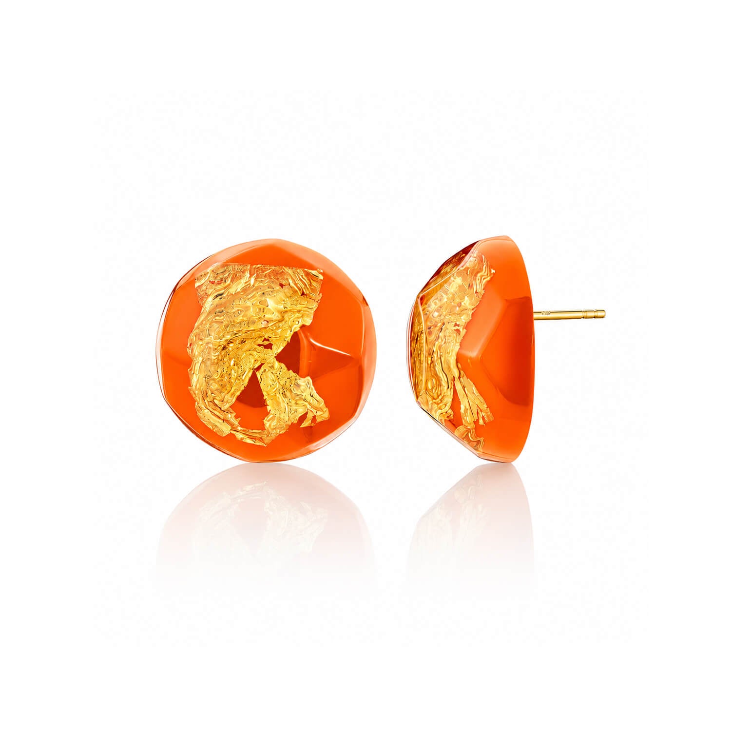 A pair of orange resin stud earrings with textured gold foil inlay, shown from both front and side angles on a white reflective background.