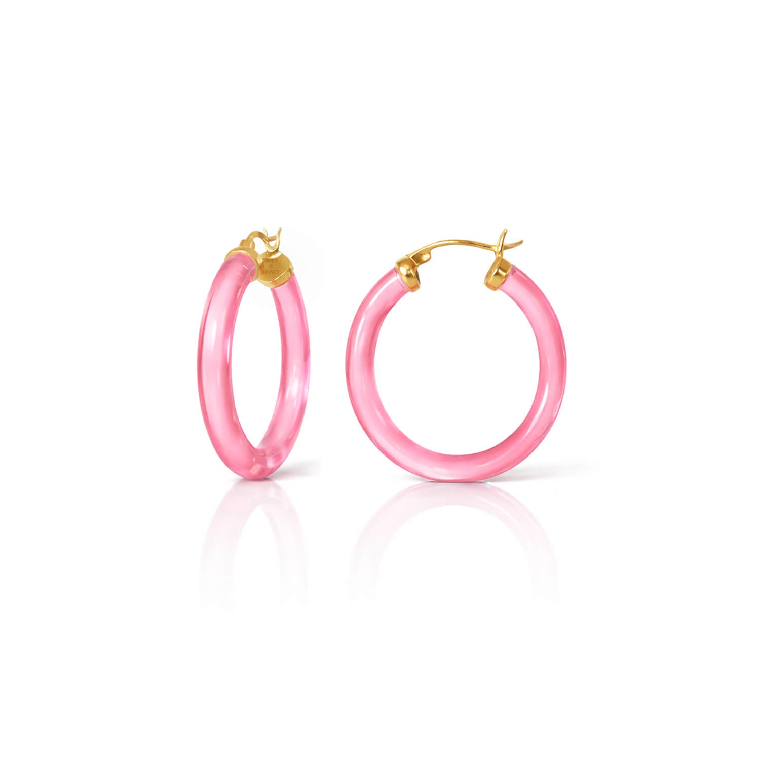 Pink hoop earrings with gold clasps on a white background
