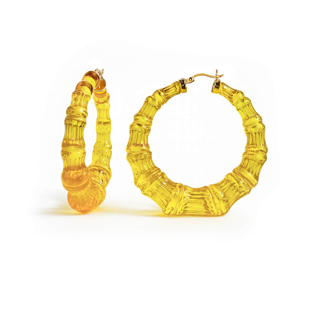 Yellow bamboo hoop earrings on a white background
