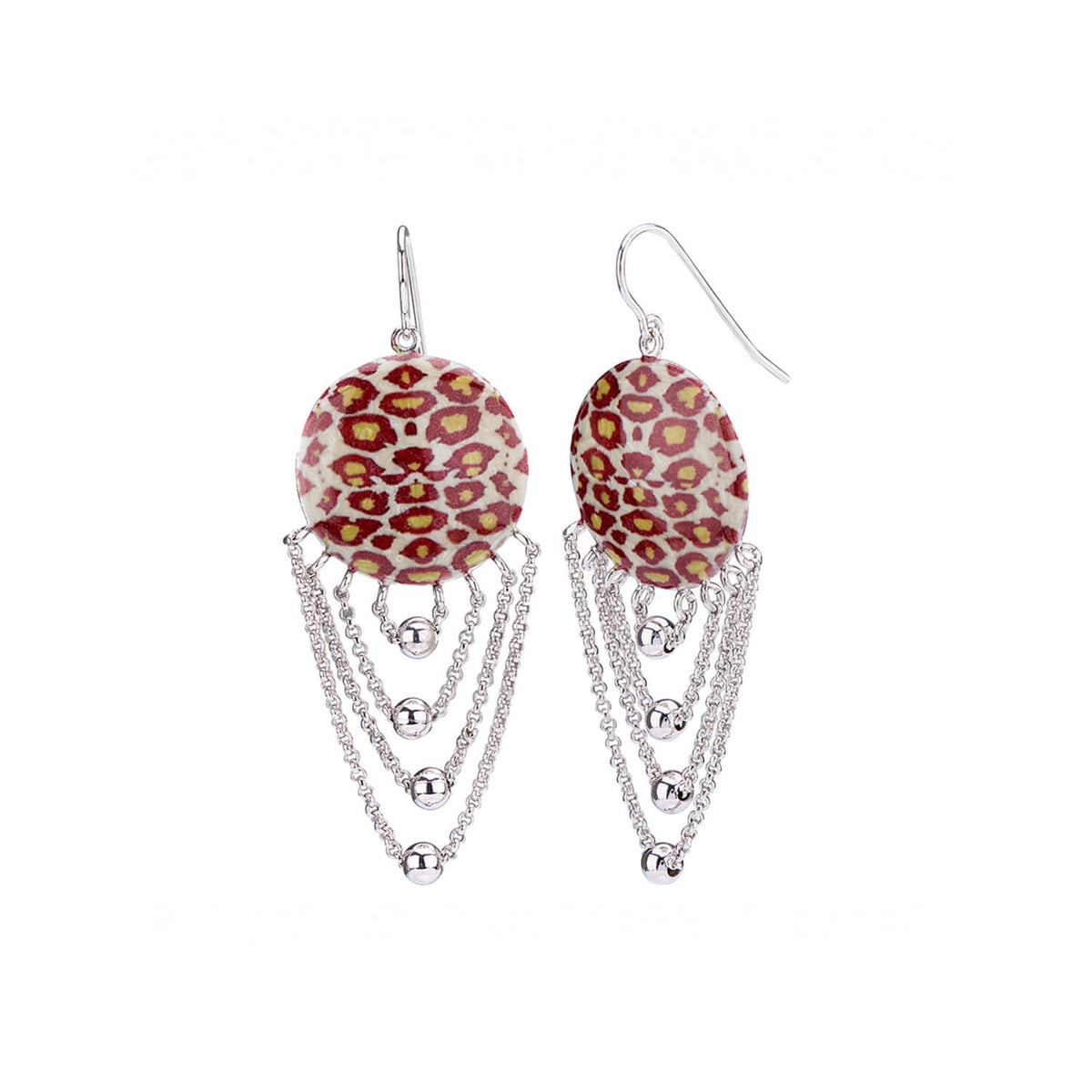 A pair of dangling earrings with round leopard-print resin pendants in red, yellow, and white, hanging from silver-tone fishhook wires with layered silver-tone chain dangles.