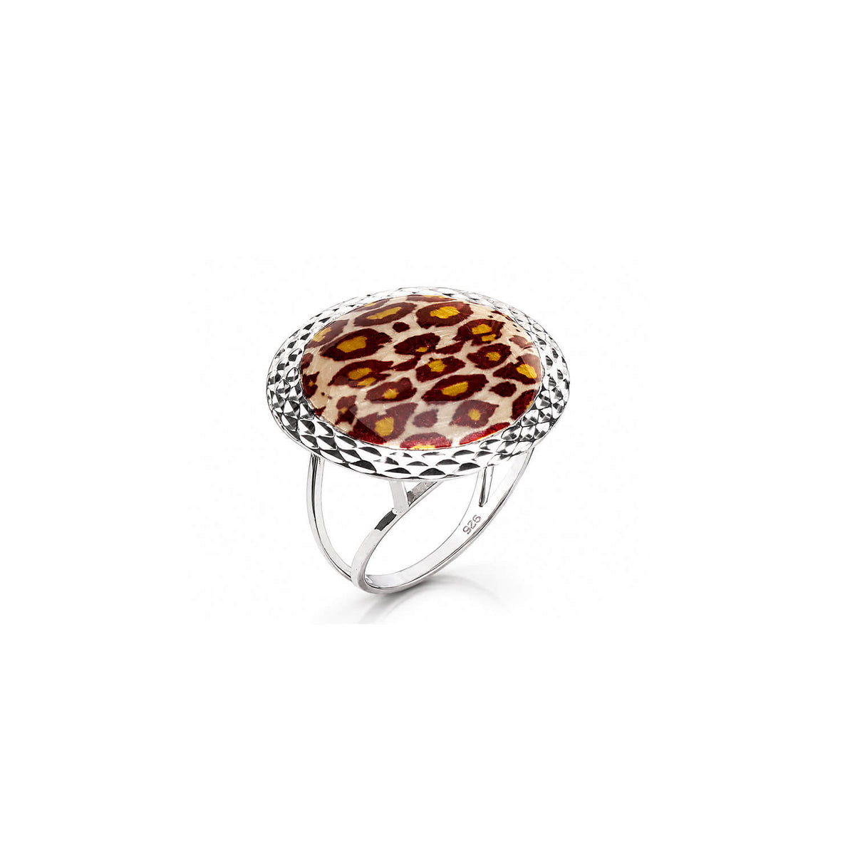 A silver ring with a textured bezel holding a round leopard print pattern in brown, orange, and cream, set against a plain white background.