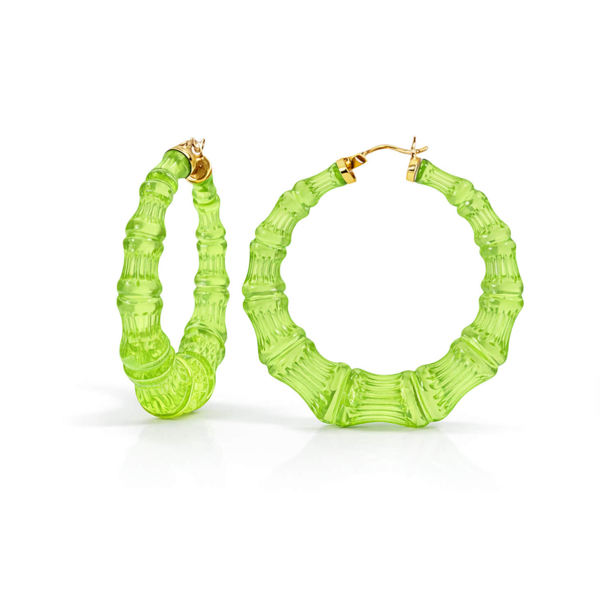 Pair of green hoop earrings on a white background