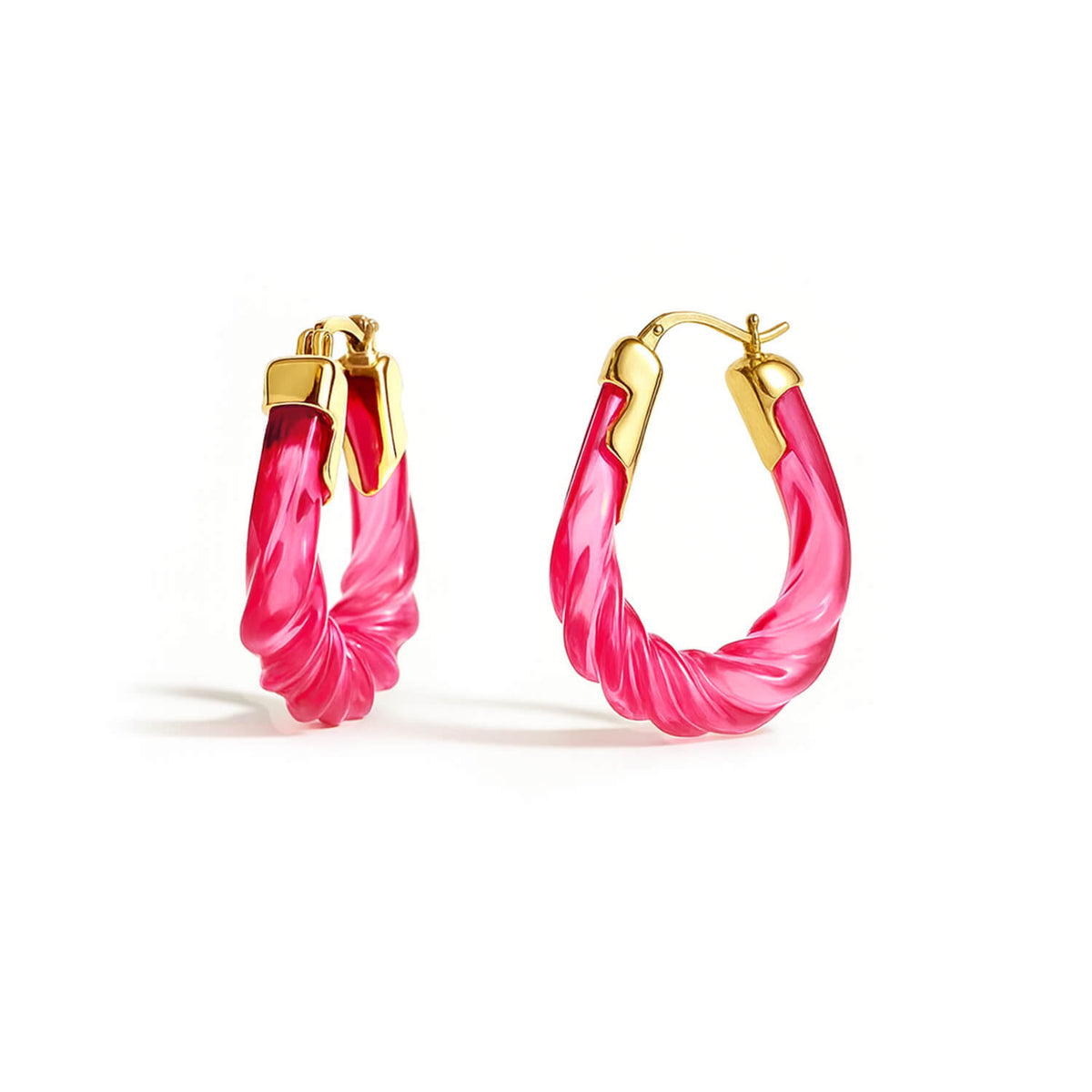 Pink hoop earrings with gold accents on a white background