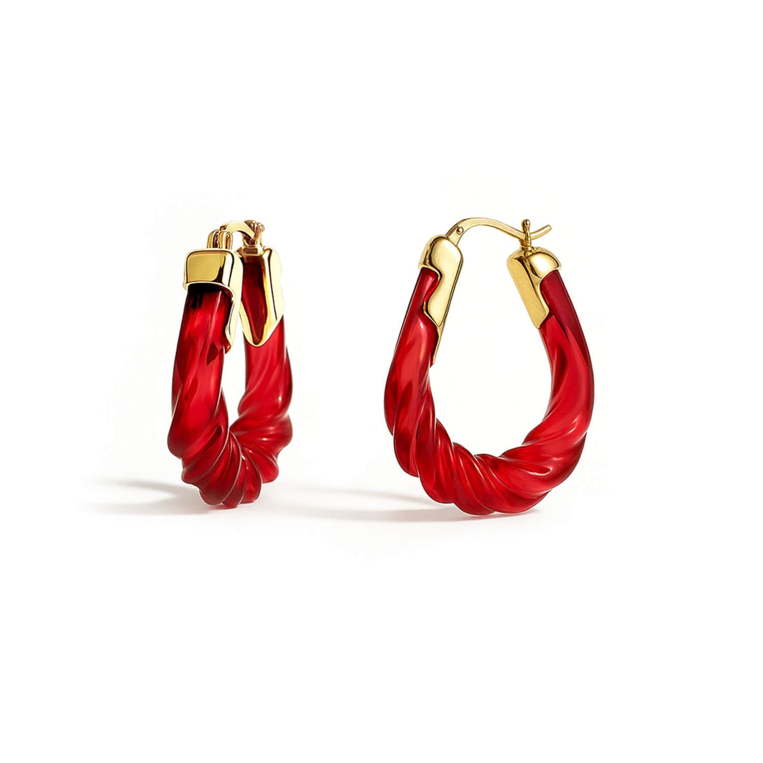 Red hoop earrings with gold accents on a white background