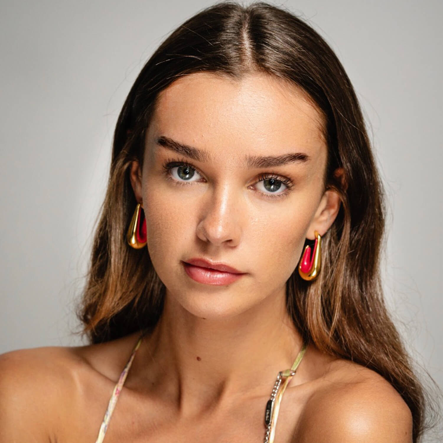 pink and gold drop hoop earrings 