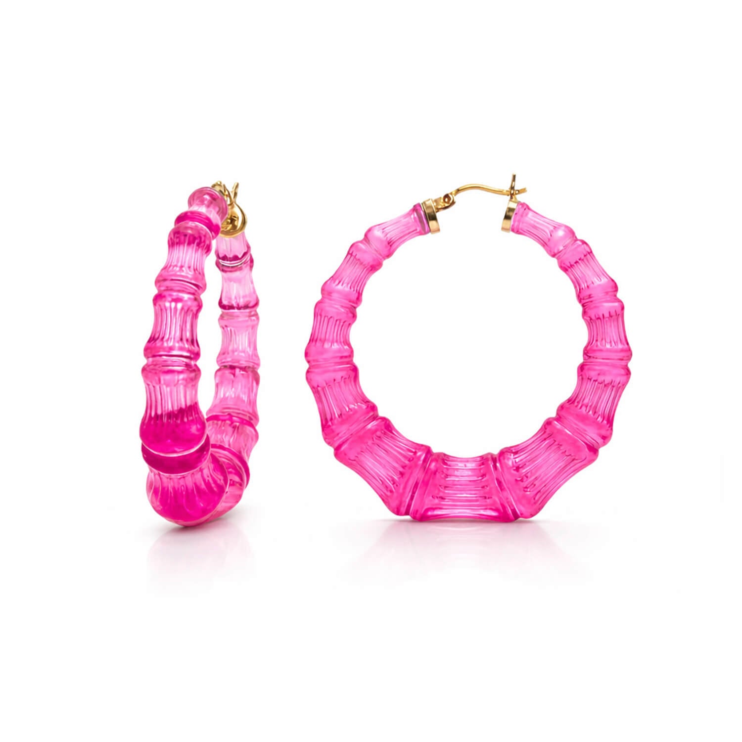 Pink hoop earrings on a white background