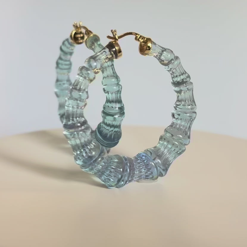 TEAL BAMBOO HOOP EARRING ON A WHITE BACKGROUND - VIDEO