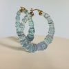 TEAL BAMBOO HOOP EARRING ON A WHITE BACKGROUND - VIDEO