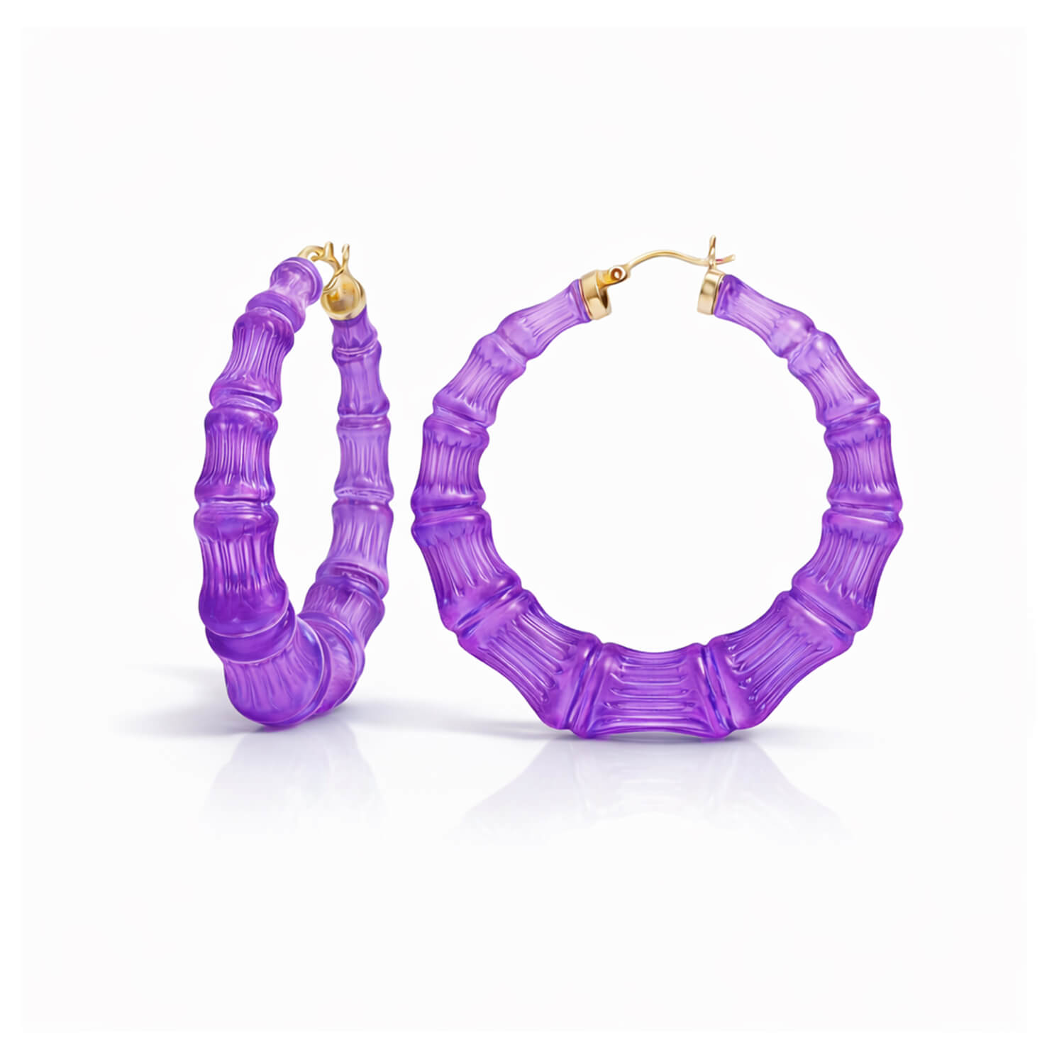 Purple hoop earrings on a white background