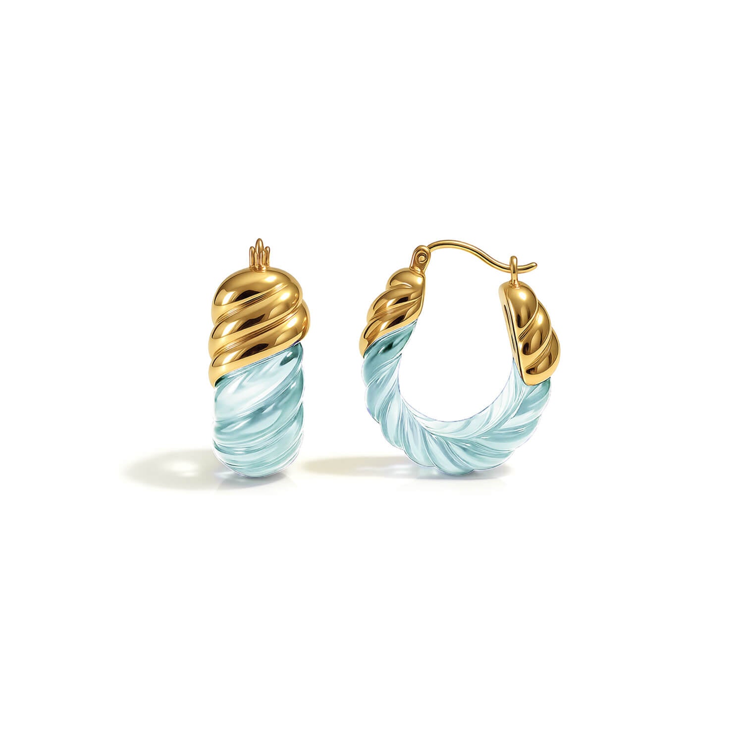 Gold and light blue hoop earrings on a white background