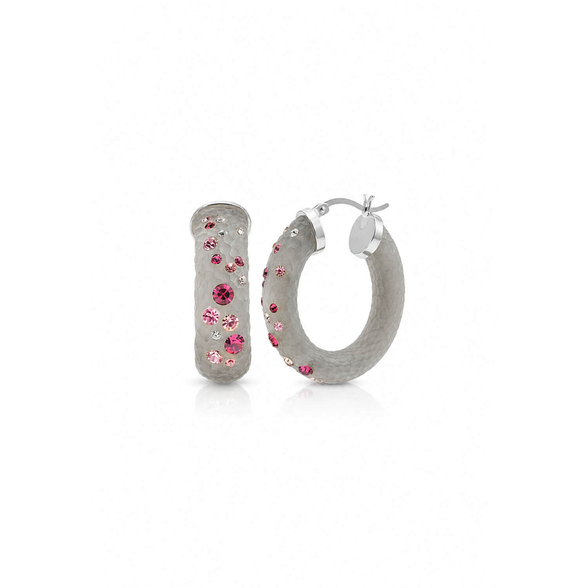Silver hoop earrings with pink gemstones on a white background