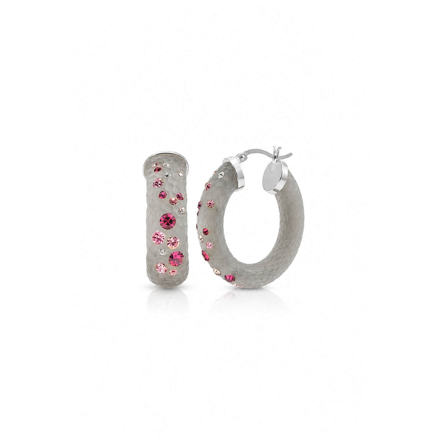 Silver hoop earrings with pink gemstones on a white background