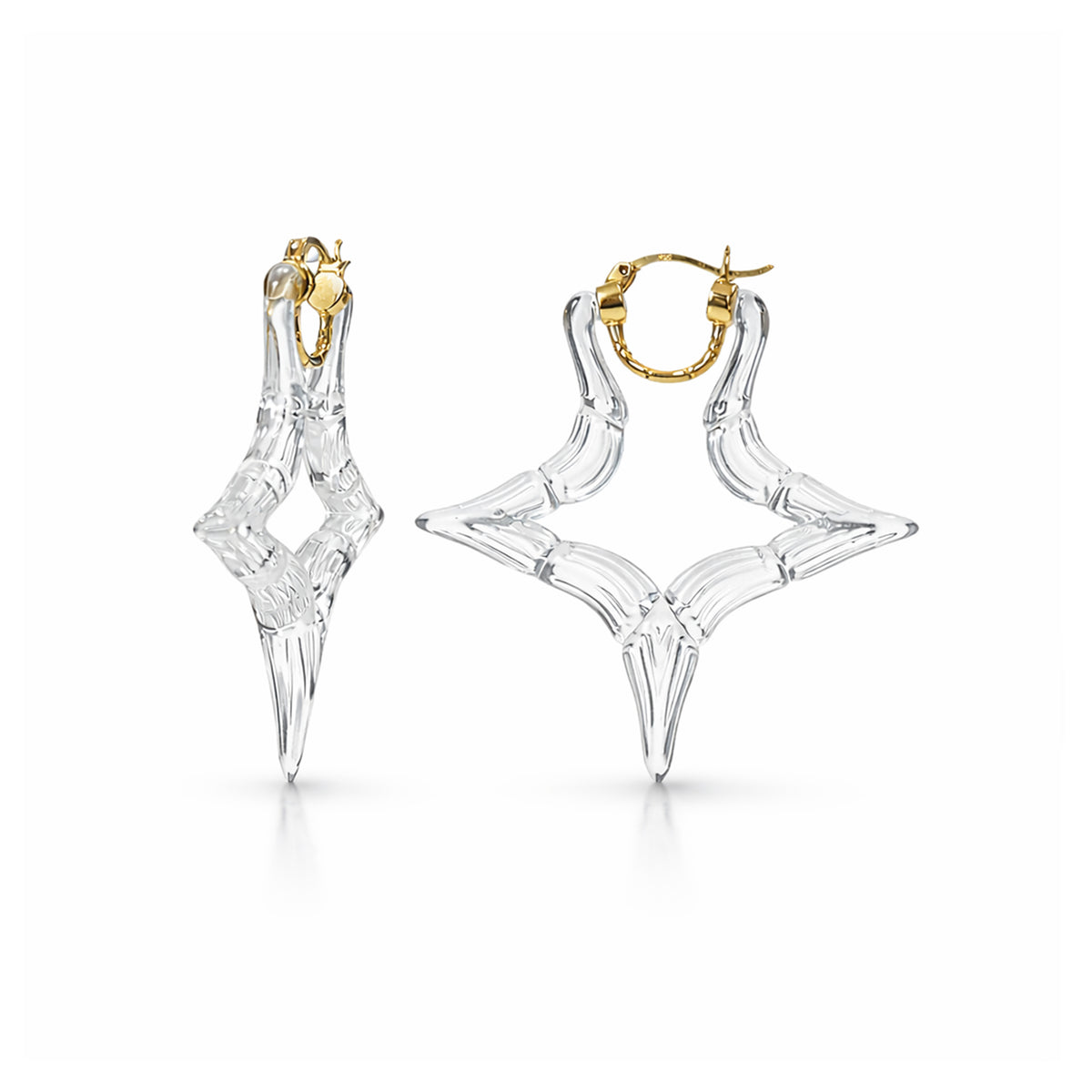 Clear geometric earrings with gold accents on a white background