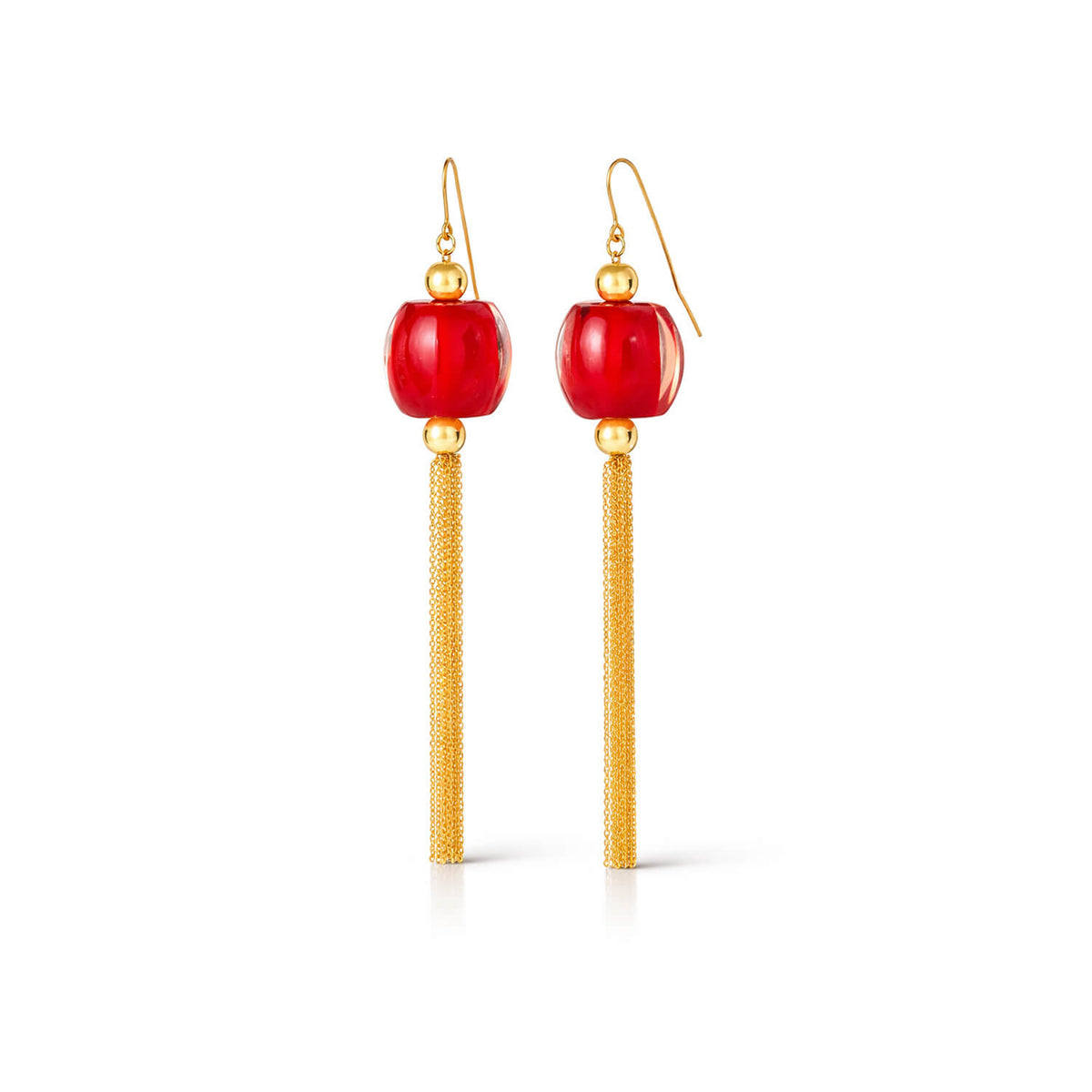 Pair of red earrings with gold tassels on a white background