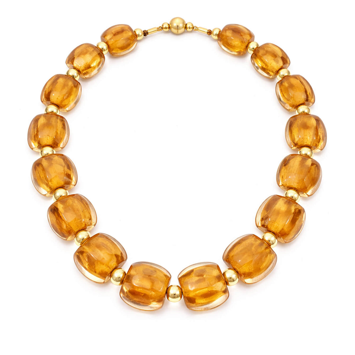 Necklace with GOLDEN amber-colored beads on a white background