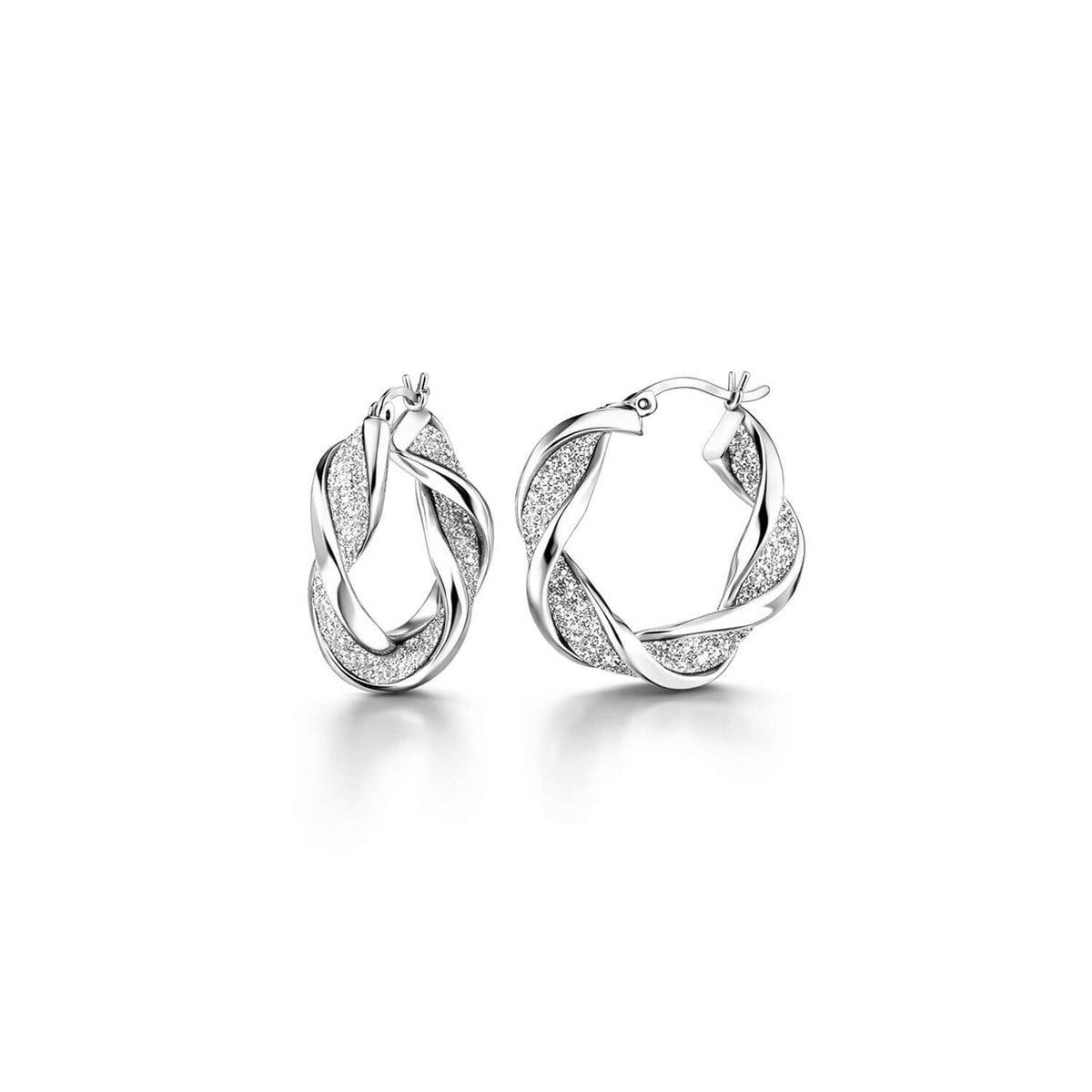 Pair of silver hoop earrings with twist designs on a white background