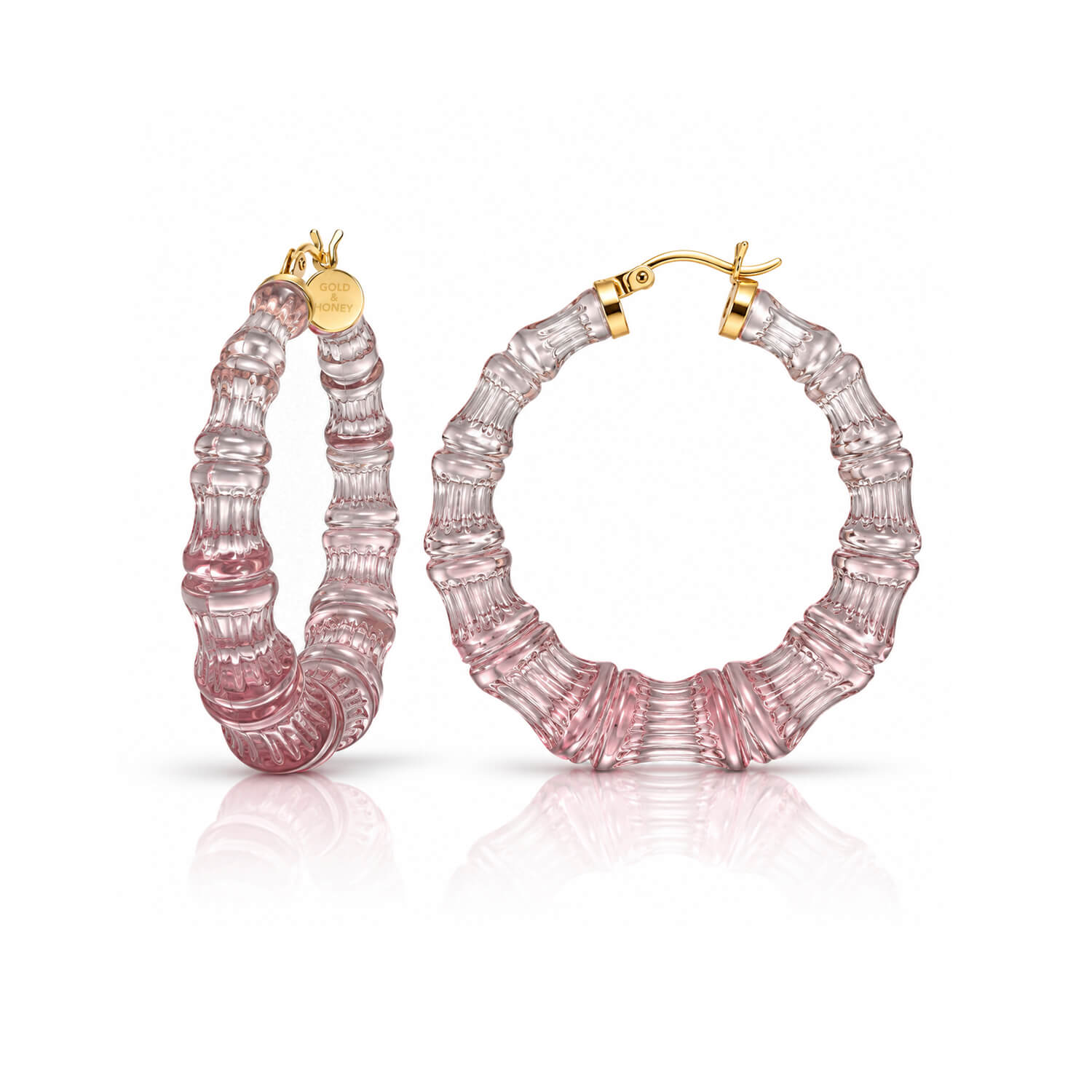 winter rose color bamboo hoop earrings on a white background