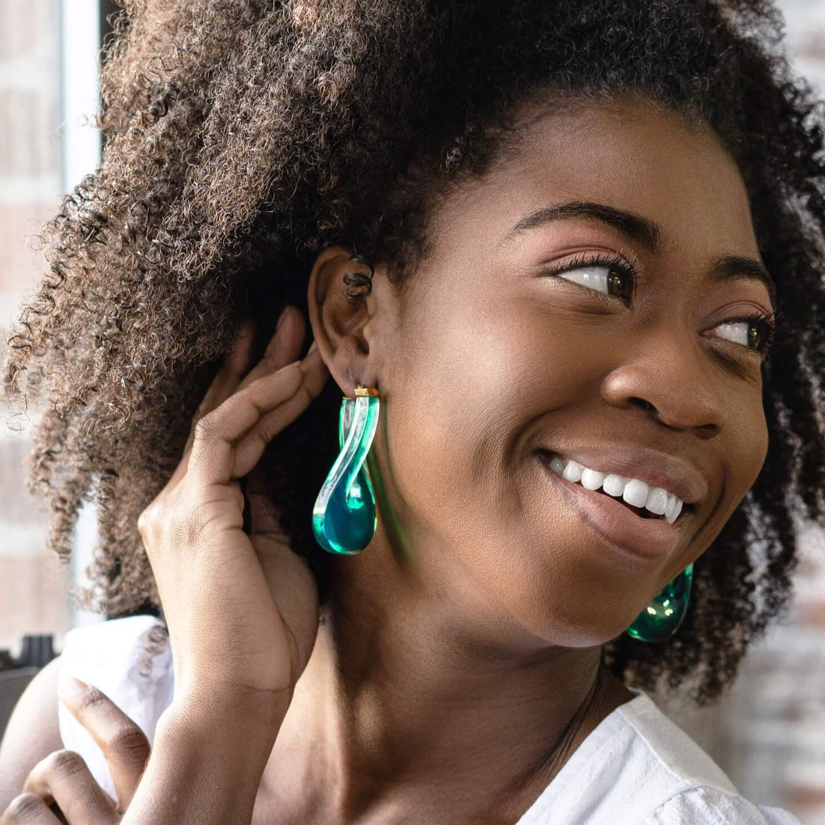 Large Twisted Horseshoes in Teal on Model