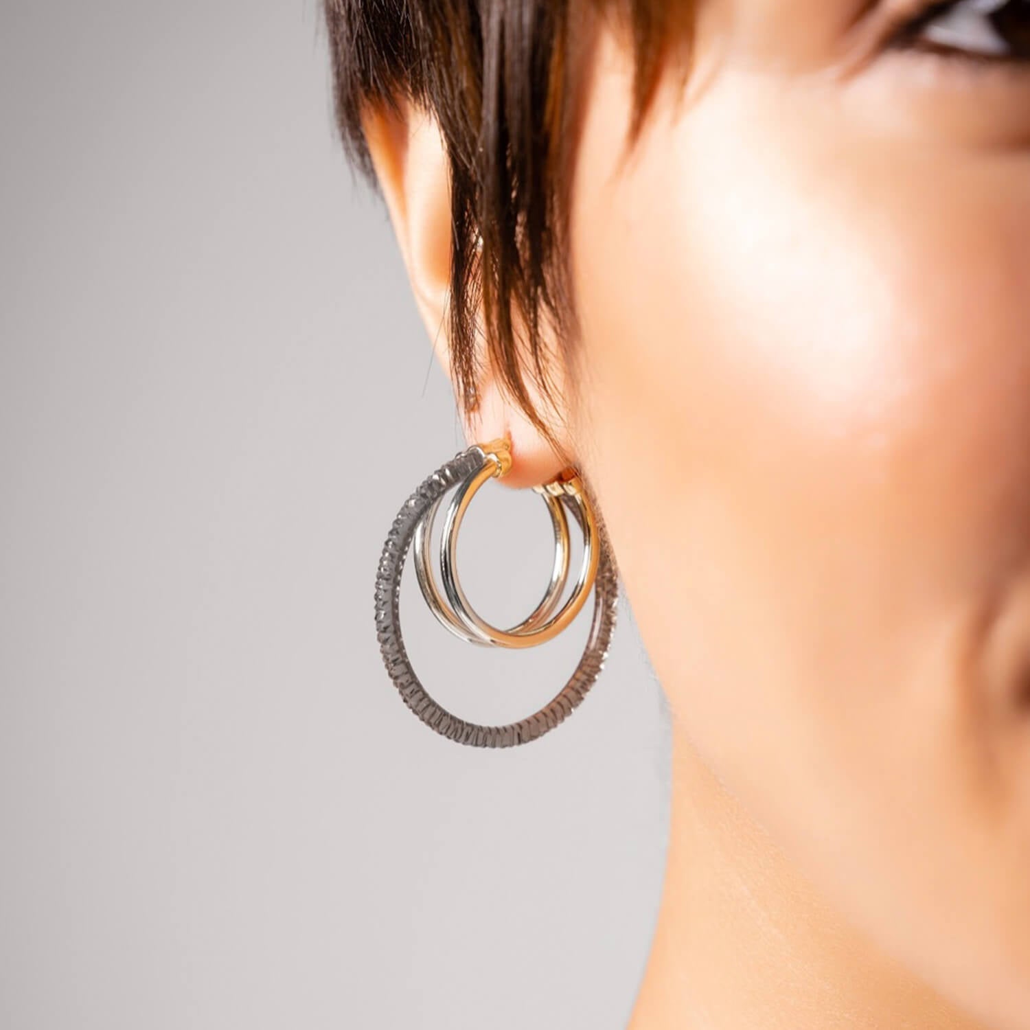 triple multi gold hoop earrings in black grey lucite
